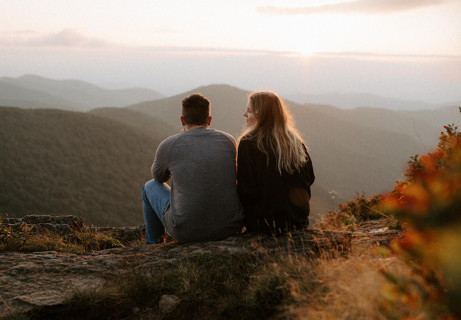 couple watches sunset at craggy gardens overlook