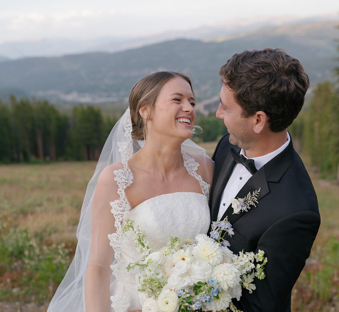 Bride and groom portrait on top of Breckenridge Mountain